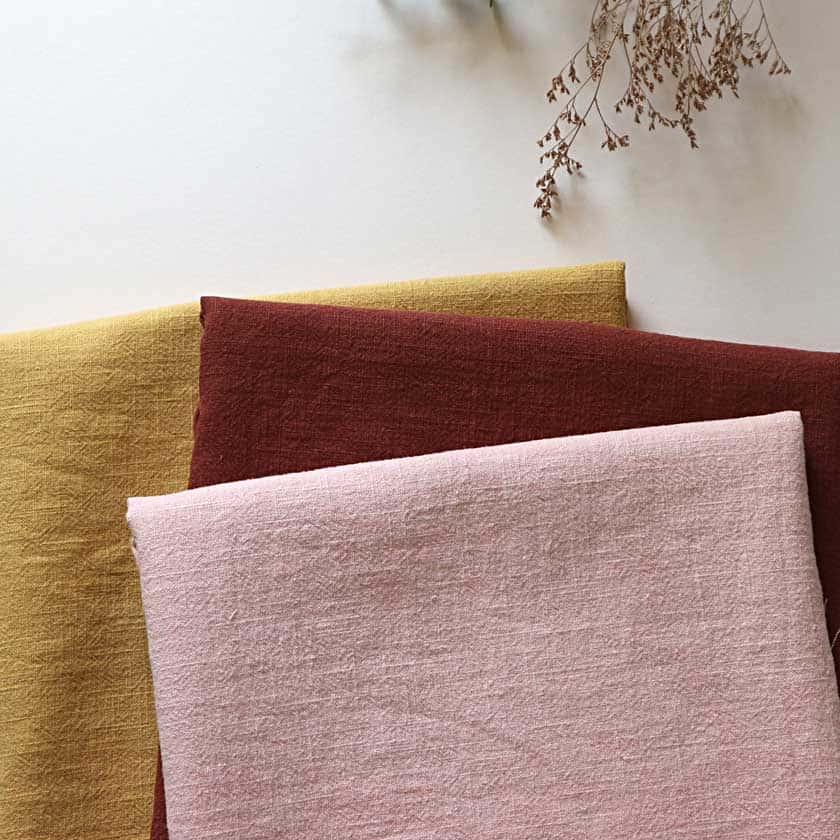 leinen-stoffe-stonewashed-in-uni-ocker-rost-lachsrosa-als-meterware-von-bartienes