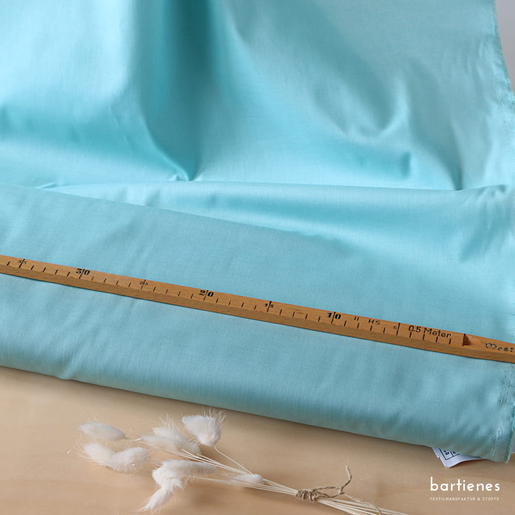 baumwollstoff-feine-popeline-als-meterware-am-ballen-mit-massstock